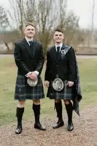 picture of two scottish men wearing tartans